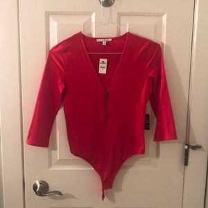 Red zippered express body suit